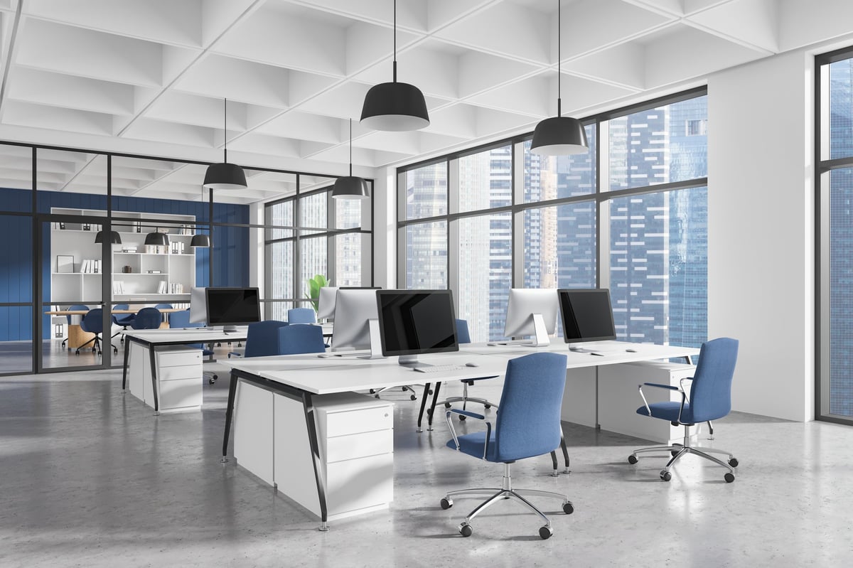 Contemporary corporate office interior with desks and computers